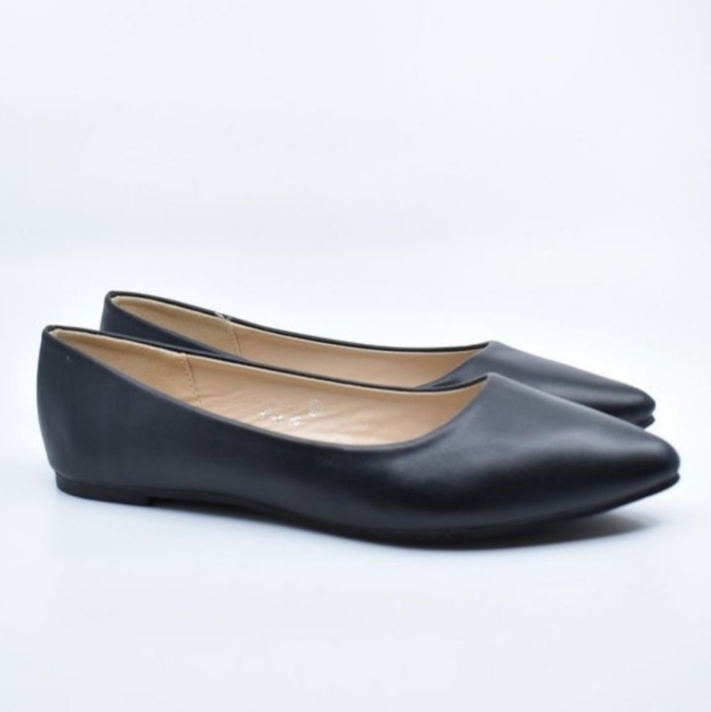 Black faux leather flats